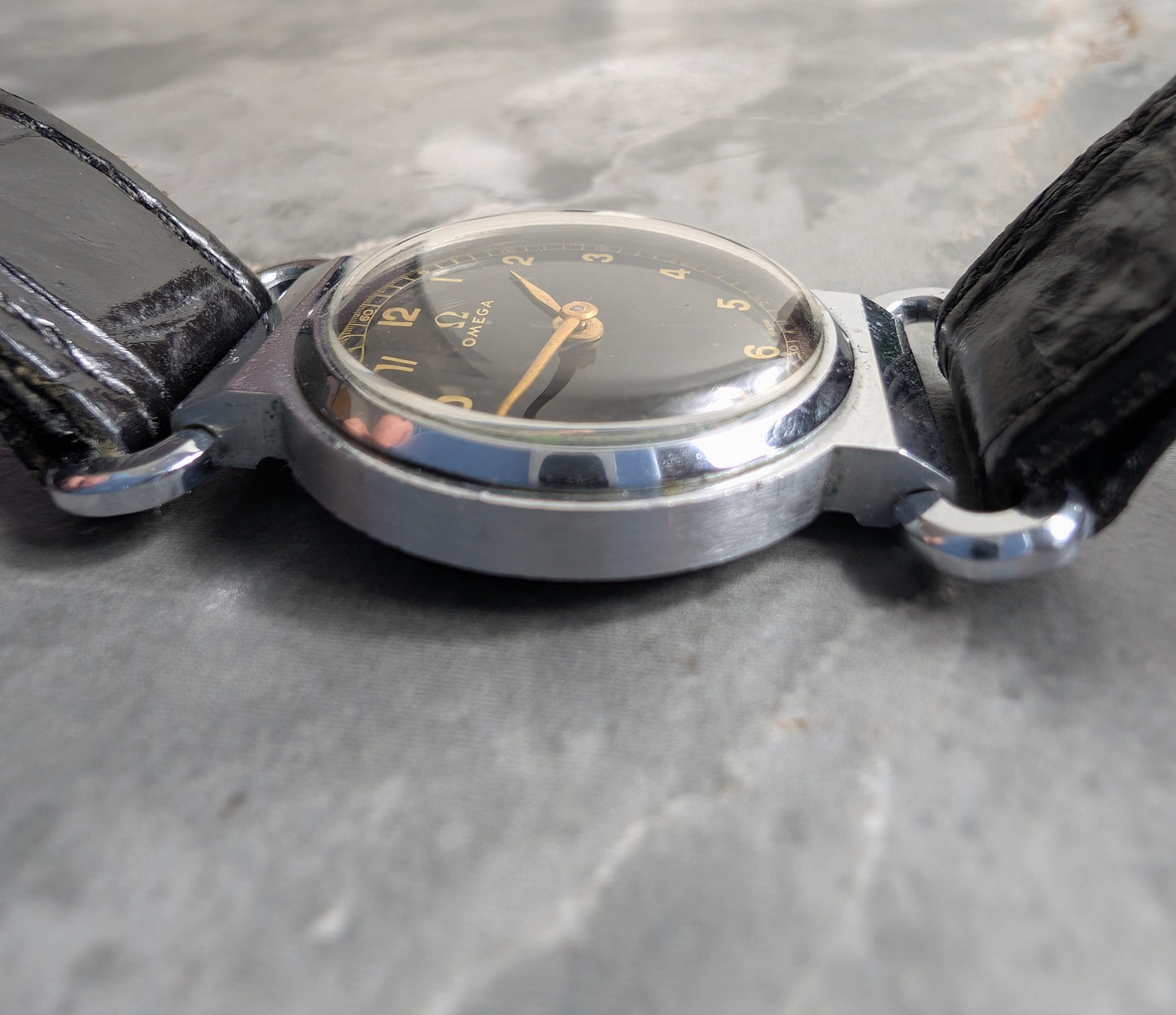 Vintage 1935 Omega Scarab Steel Wristwatch | Black Gilt Dial